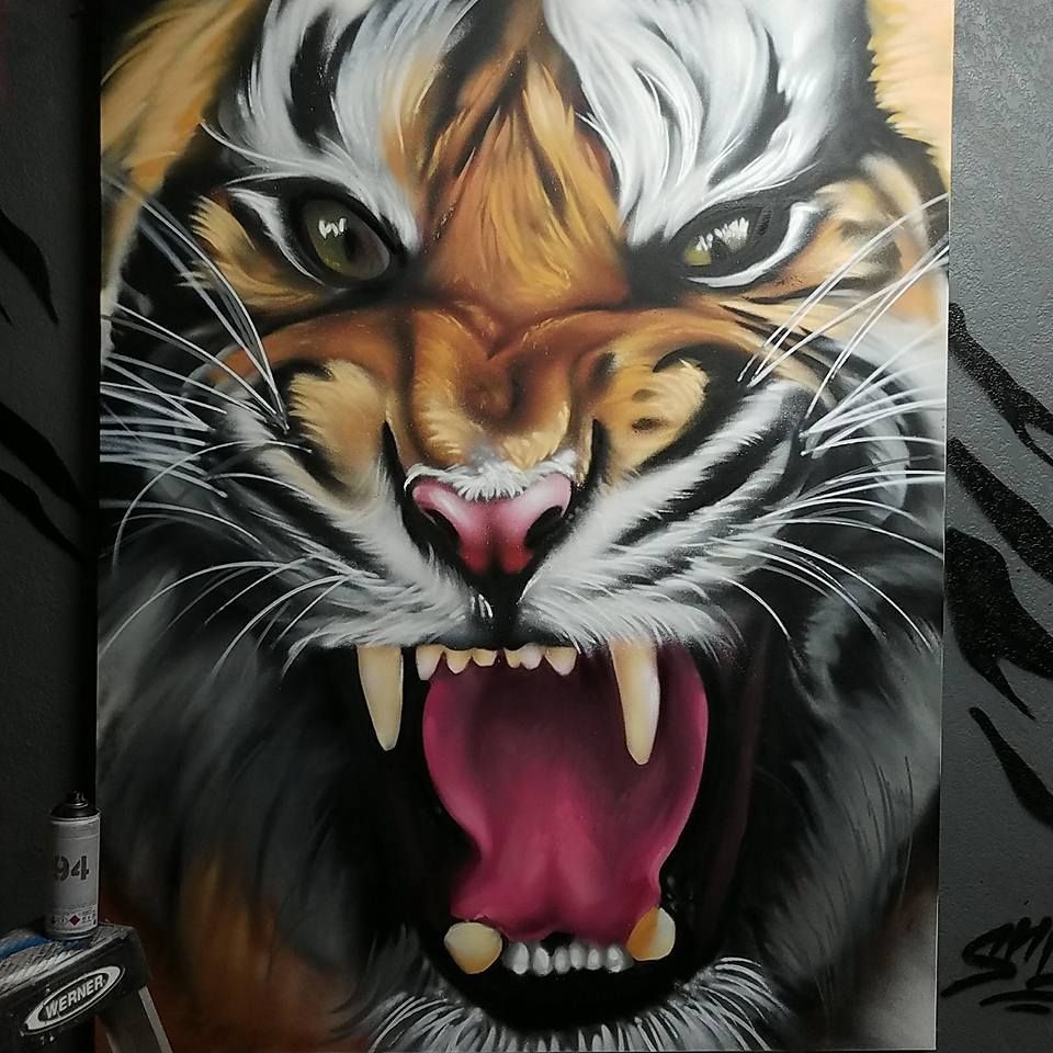 Roaring tiger portrait painted freehand in aerosol realism on a studio canvas panel